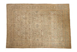 Vintage distressed Kerman carpet with an allover floral arabesque design in muted ivory, sand, and slate blue.