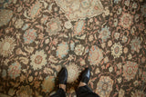 Close view of a distressed Mahal carpet with floral palmettes in powder blue and red.