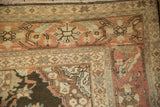 Intricate Herati-like border on a vintage Mahal carpet with a distressed, low-pile texture.