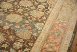 Low-pile texture of a vintage Mahal carpet's floral field and Herati-style border.