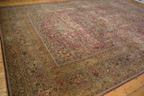 Distressed Meshed carpet, showing detailed palmette border and field's scrolling arabesques.