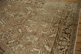 Low-pile texture of a vintage distressed rug showing a geometric Turtle Samovar border.