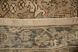 The secured side cord selvage and hand knotted foundation of a vintage Persian Mehrivan carpet.