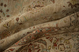 Distressed vintage Kashan rug: beige field, floral palmettes, textured pile, and main border.