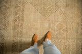 Hand-knotted Persian Joshegan rug with heavy abrashes and faded floral guls.