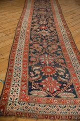 Lengthwise view of an antique Malayer runner highlighting its intricate traditional Herati pattern.