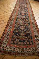 Full length perspective of an antique Malayer runner showing its traditional allover pattern.