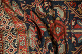 A softly draped view of a fine antique Malayer runner, showing rich texture and detailed Herati motifs.