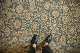 Distressed Malayer carpet with dusty teal and beige palmette patterns, showing even wear to knot heads.