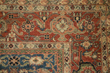 Afghani Mahal rug corner featuring rust red Herati motif and sapphire blue Samovar Turtle border.