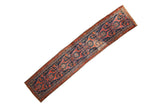 Vintage Malayer rug runner with geometric animal and floral motifs in navy blue and madder rust.