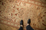 Distressed antique Karabagh runner, short pile, starburst medallion, trefoil finials, and floral motifs.