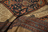 Intact wide camel border with intricate brick red, mallard teal, and navy patterned stripes on antique Serab rug.