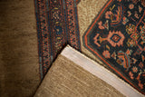 Antique Serab runner corner, showing intact side cord selvage, camel border, and hand-knotted foundation.