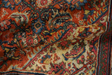 Close view of the textured hand-knotted pile on a vintage Persian Mahal carpet.