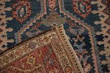 Hand-knotted foundation and sturdy side selvage visible on a folded corner of an antique Malayer rug.
