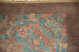 Vintage Fette-Li carpet detail, showcasing tone-on-tone floral vines in seafoam and dusty rose.