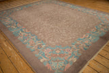Vintage Fette-Li rug corner with seafoam green bird motifs and subtle tone-on-tone leaf pattern.