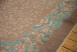 Vintage Fette-Li carpet detail with seafoam blue birds and eucalyptus blossoms on border.