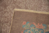 Hand knotted Fette-Li carpet corner, showing plush beige pile and woven back with rose, blue.