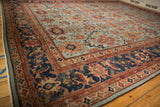 Antique Sultanabad carpet's sapphire blue Herati border and powder blue field, blush palmette.
