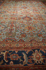 Antique Persian Sultanabad carpet's oversize Herati border and powder blue field with palmettes.