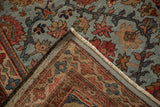Corner of antique Sultanabad carpet, showing powder blue field, Herati border, and original selvage.