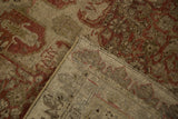 Back of an antique Bijar rug showing the hand-knotted foundation and machine-bound side.