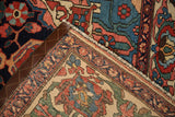 The secured side cord and hand-knotted foundation of a vintage Bakhtiari rug.