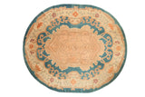 Antique Chinese Arts and Crafts oval carpet, oversized medallion, scrolling vines, blue, beige.