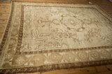 Distressed Kars rug corner showing decorative sand borders and machine bound edge.