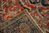 Detail of the hand-knotted foundation and machine-bound edge on a vintage Ahar carpet.
