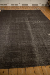 Angled view of the vintage Turkish Kilim showing its textured, abrash ground.