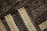 Detail of textured hand woven Turkish Kilim with charcoal, ivory bands, and selvage.
