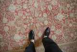Vintage Distressed Persian Mahal carpet showcasing faded red floral arabesques and blue accents.