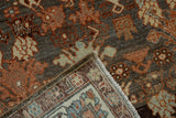 Detail of a hand-knotted Malayer rug showing its woven back and intact side cord selvage.