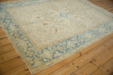 Vintage Heriz carpet corner showing the dusty blue Turtle Samovar and Herati design border.