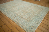 Distressed vintage Mehrivan showing geometric floral field and faded blue Turtle Samovar border.
