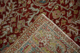 Hand-knotted foundation and cherry red pile on the folded corner of a vintage Ahar carpet.