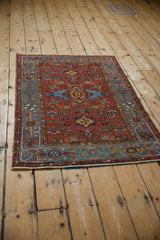 Intricate sky blue Samovar motif border and geometric patterns on the brick red Karaja rug.