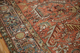 Detail of the Turtle Samovar border and geometric field on a vintage Heriz carpet.