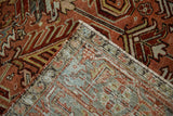 Hand-knotted back weave and secured side cord of a vintage distressed Persian Heriz carpet.