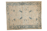 Vintage distressed Mehrivan carpet with an ivory geometric field and a cobalt blue Turtle Samovar border.