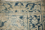 Distressed pile texture highlights the Turtle Samovar motif in cobalt blue and beige.