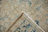 Sturdy hand-knotted back and distressed pile of a vintage Mehrivan rug's corner.