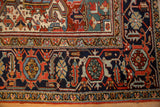 Vintage Heriz carpet detail: navy blue border with Turtle Samovar and Herati floral motifs.