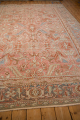 Angled perspective of a vintage Heriz carpet with its intricate Turtle Samovar border in slate blue.
