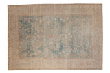 Vintage distressed Tabriz carpet with an allover floral design and heavy abrashes in powder blue and beige.