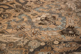 Angled view of the hand-knotted pile on a vintage Khoy carpet showing its abrashed texture.