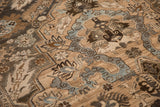 Close-up of the Persian carpet's abrashed ground and silver-blue cloudband design.